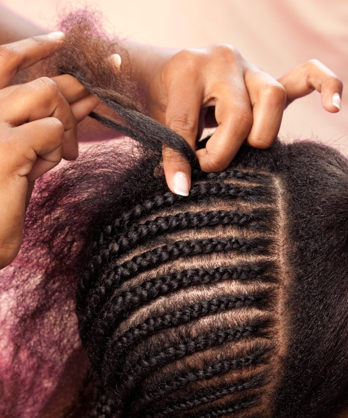 Professional stylist at work, showing precision and care